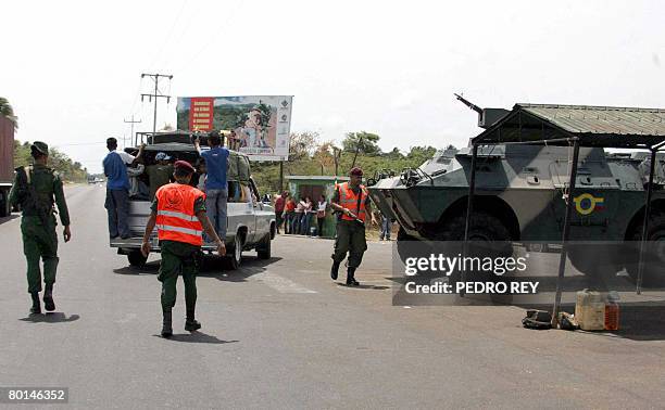An armoured vehicle of the Venezuelan Army stands in position at a checkpoint in Paraguachon, in the state of Maracaibo, in the Venezuelan border...