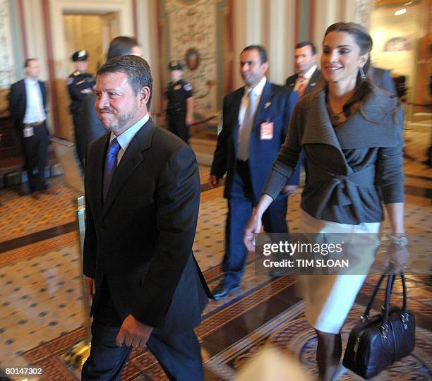 King Abdullah and Queen Rania of Jordan arrive for a meeting with members of the Senate Foreign Relations Committee inside the US Capitol on March 6,...