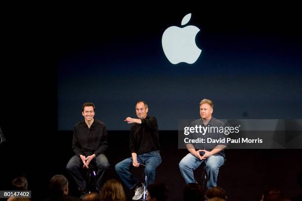 Scott Forstall, vice president of iPhone software, Apple CEO Steve Jobs and Phil Schiller, senior vice president of marketing answer questions from...