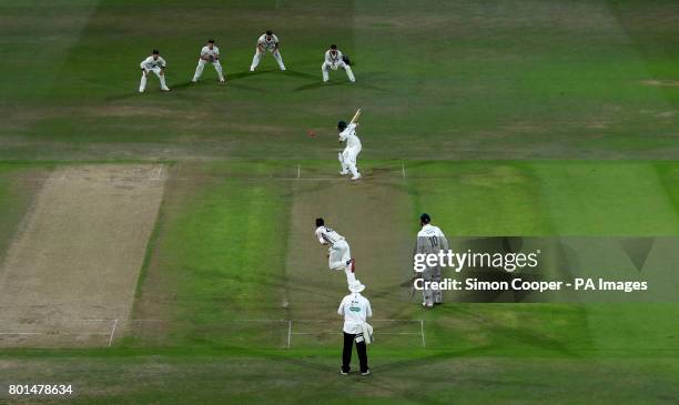 Match action under the floodlights during the Specsavers County Championship, Division Two match at Trent Bridge, Nottingham.