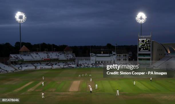 Match action under the floodlights during the Specsavers County Championship, Division Two match at Trent Bridge, Nottingham.