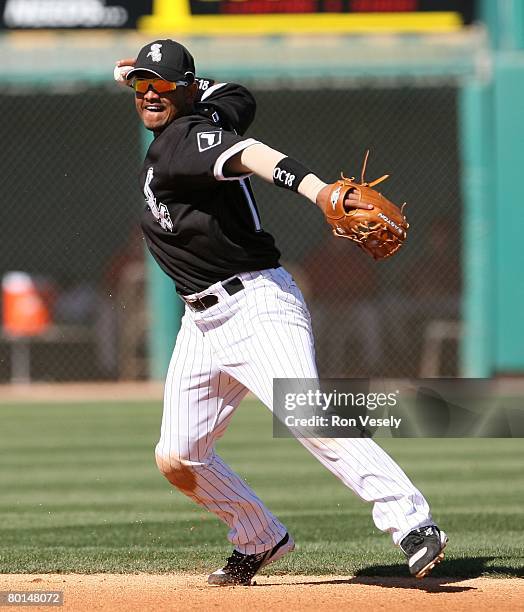 Orlando Cabrera of the Chicago White Sox throws to first base during the game against the Los Angeles Angels at Tucson Electric Park in Tucson...