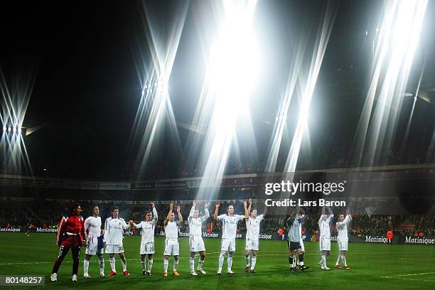 Munich players celebrate after winning the UEFA Cup Round of 16 first leg match between RSC Anderlecht and Bayern Munich at the Constant Vanden Stock...