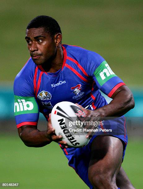 Wes Naiqama of the Knights runs the ball during the NRL trial match between the Warriors and the Newcastle Knights at North Harbour Stadium on...