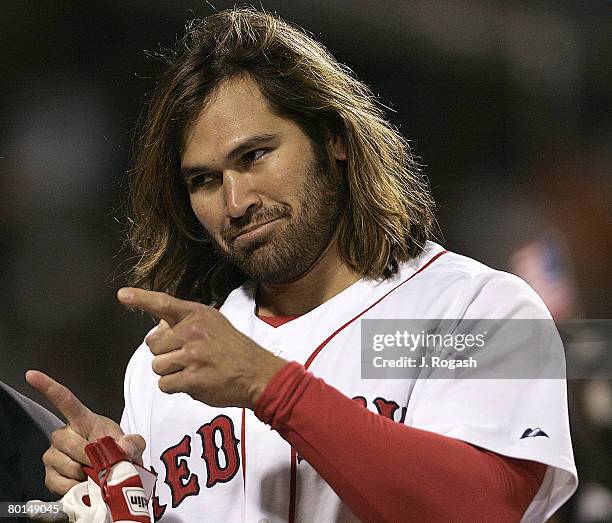 Red Sox celebrate after teammate Johnny Damon connected for a game winning hit in the ninth inning in a game between the Boston Red Sox and the...