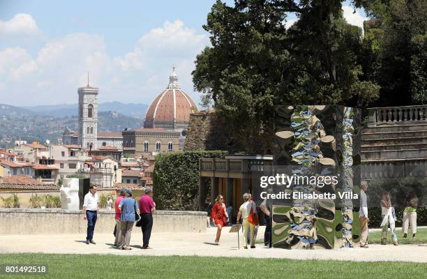 Guests at the preview as contemporary artist Helidon Xhixha opens his new exhibition of sculpture at Boboli Garden on June 26, 2017 in Florence,...