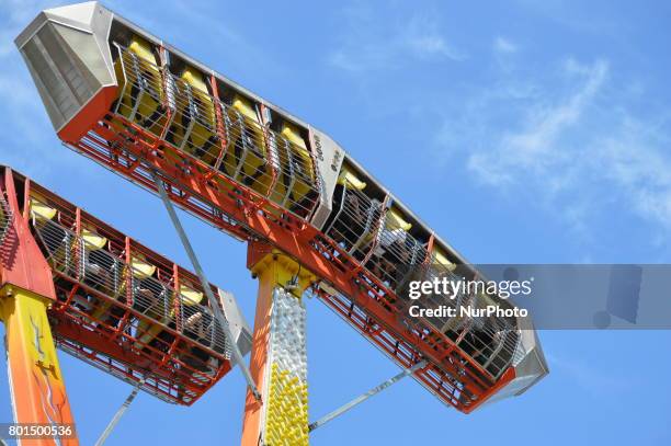 Families and children enjoy the holiday at the amusement park on the second day of Eid al-Fitr in Ankara, Turkey on June 26, 2017.