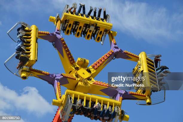 Families and children enjoy the holiday at the amusement park on the second day of Eid al-Fitr in Ankara, Turkey on June 26, 2017.