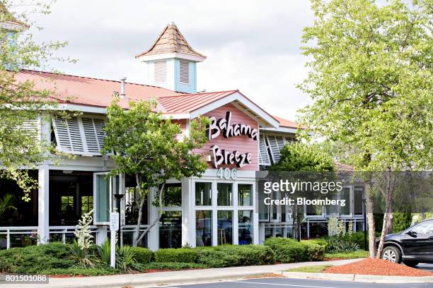 Darden Restaurants Inc. Bahama Breeze Island Grille location stands in Schaumburg, Illinois, U.S., on Thursday, June 22, 2017. Darden Restaurants...