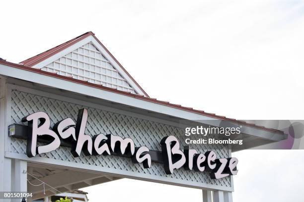 Signage is displayed at a Darden Restaurants Inc. Bahama Breeze Island Grille location in Schaumburg, Illinois, U.S., on Thursday, June 22, 2017....