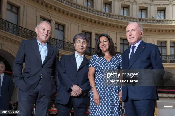 Of Kering Group, Francois-Henri Pinault, Architect Tadao Ando, Mayor of Paris Anne Hidalgo and Francois Pinault attend the Press Conference to...