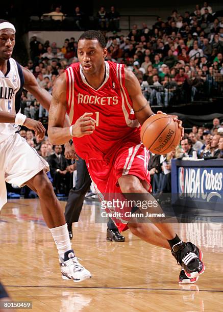 Tracy McGrady of the Houston Rockets drives against Josh Howard of the Dallas Mavericks on March 6, 2008 at the American Airlines Center in Dallas,...