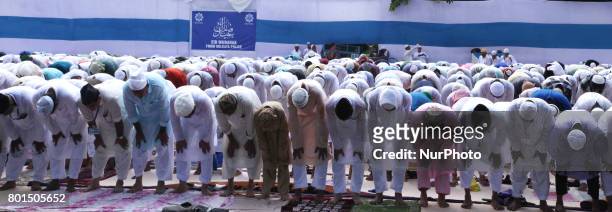 Indian Muslims offer prayers during Eid al-Fitr at Red Road on June 26,2017 in Kolkata,India. Muslims around the world are celebrating the Eid...