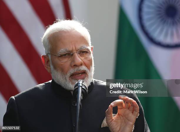 Indian Prime Minister Narendra Modi speaks while delivering joint statements with U.S. President Donald Trump in the Rose Garden of the White House...