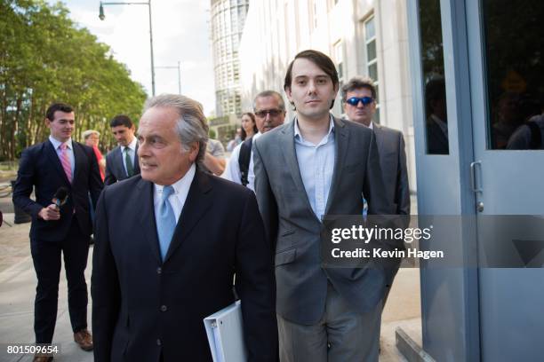 Ex-pharmaceutical executive Martin Shkreli leaves with his lawyer Benjamin Brafman after his appearance at the U.S. District Court for the Eastern...