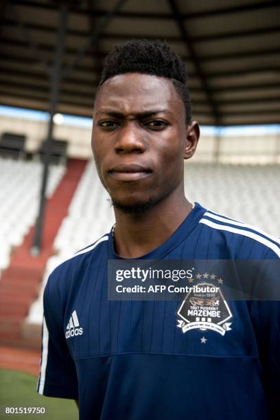 This photograph taken on May 11 shows Arsene Zola, former member of the Katumbi Football Academy and current member of the Tout-Puissant Mazembe, at...