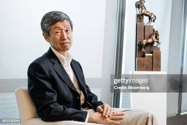 Shan Weijian, chairman and chief executive officer of PAG Asia Capital, poses for a photograph in Hong Kong, China, on Monday, June 19, 2017. Shan's...