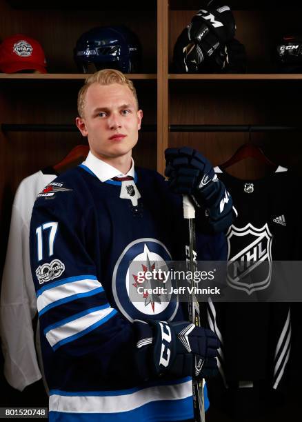 Kristian Vesalainen, 24th overall pick of the Winnipeg Jets, poses for a portrait during Round One of the 2017 NHL Draft at United Center on June 23,...