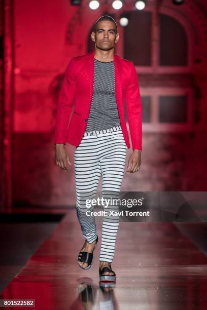 Model walks the runway at the Miquel Suay show during the Barcelona 080 Fashion Week on June 26, 2017 in Barcelona, Spain.