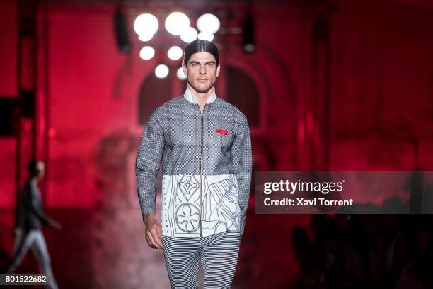 Model walks the runway at the Miquel Suay show during the Barcelona 080 Fashion Week on June 26, 2017 in Barcelona, Spain.