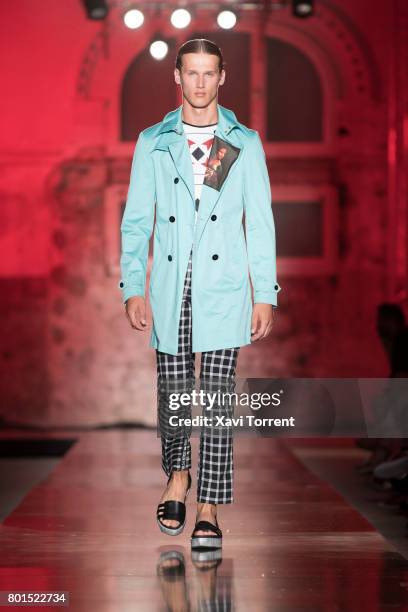 Model walks the runway at the Miquel Suay show during the Barcelona 080 Fashion Week on June 26, 2017 in Barcelona, Spain.