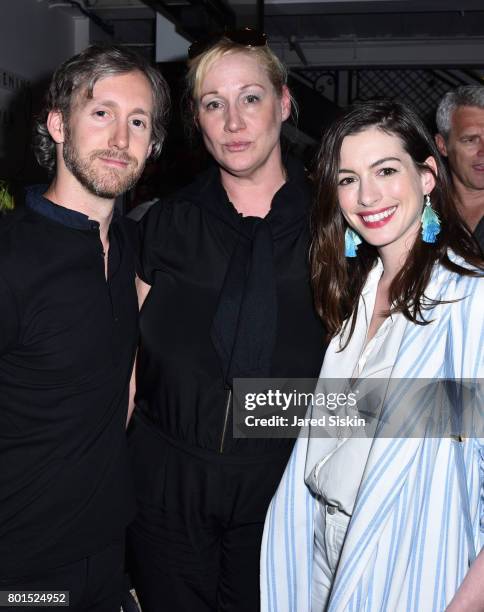 Adam Shulman, Amy Sacco and Anne Hathaway attend TriStar Pictures with The Cinema Society & Avion host a screening of "Baby Driver" at Metrograph on...