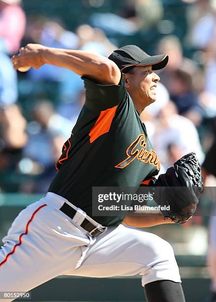 Keiichi Yabu of the San Francisco Giants pitches during a Spring Training game against the Los Angeles Angels of Anaheim at Tempe Diablo Stadium on...