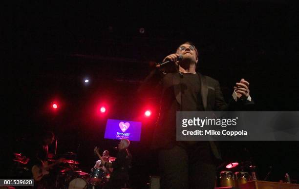 Bono and U2 perform on stage at the 13th Annual MusiCares MAP Fund Benefit Concert at the PlayStation Theater on June 26, 2017 in New York City....