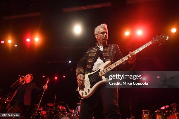 Bono and Adam Clayton of U2 perform on stage at the 13th Annual MusiCares MAP Fund Benefit Concert at the PlayStation Theater on June 26, 2017 in New...