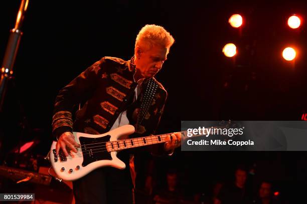 Adam Clayton of U2 performs on stage at the 13th Annual MusiCares MAP Fund Benefit Concert at the PlayStation Theater on June 26, 2017 in New York...