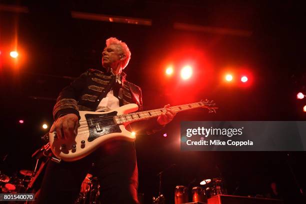 Adam Clayton of U2 performs on stage at the 13th Annual MusiCares MAP Fund Benefit Concert at the PlayStation Theater on June 26, 2017 in New York...