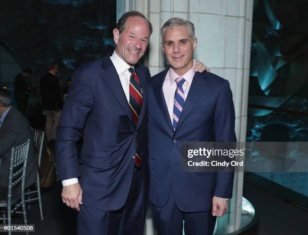 Former Governor of New York Eliot Spitzer and Freeing Voices Changing Lives Award Recipient Eric Dinallo attends the American Institute for...