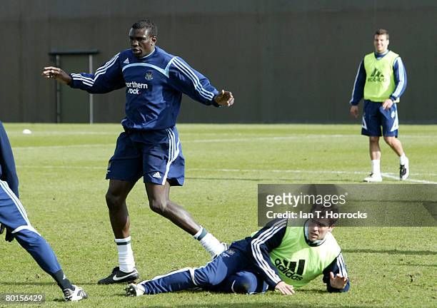 New signing Lamine Diatta and Michael Owen during a Newcastle United training session at the Little Benton training ground on March 7, 2008 in...