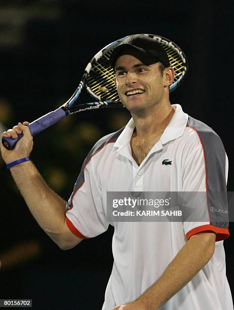Andy Roddick reacts after beating Serbia's Novak Djokovic in their semi-final tennis match for the ATP Dubai Tennis Championships in the Gulf emirate...
