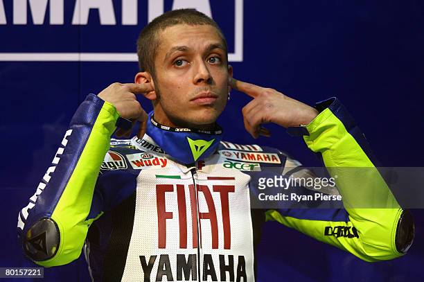 Valentino Rossi of Italy and the Fiat Yamaha Team looks on from the pits during practice for the Motorcycle Grand Prix of Qatar, round one of the...