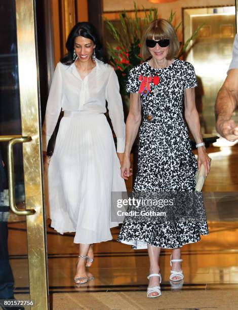 Houma Abedin and Anna Wintour are seen on June 26, 2017 in New York City.