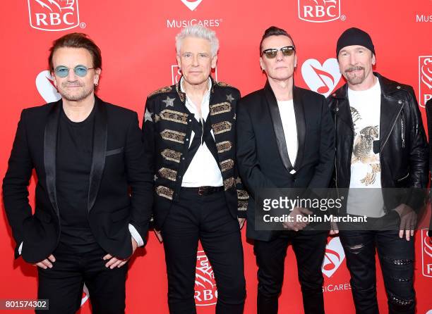 Bono, Adam Clayton, Larry Mullen, and The Edge of U2 attend 13th Annual Musicares MAP Fund Benefit Concert Honoring Adam Clayton at PlayStation...