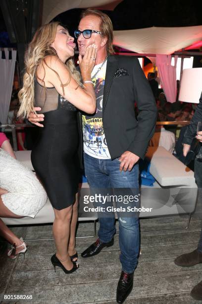 Carmen Geiss kisses her husband Robert Geiss during the Movie meets Media Party during the Munich Film Festival on June 26, 2017 in Munich, Germany.