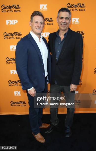 Executive producers Trevor Engelson and Michael London attend the premiere of FX's "Snowfall" at The Theatre at Ace Hotel on June 26, 2017 in Los...