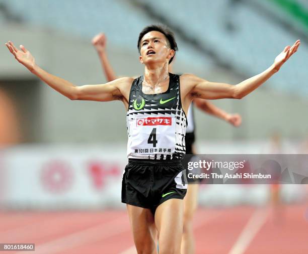 Suguru Osako celebrates winning the Men's 10000m during day one of the 101st JAAF Athletics Championships at Yanmar Stadium Nagai on June 23, 2017 in...