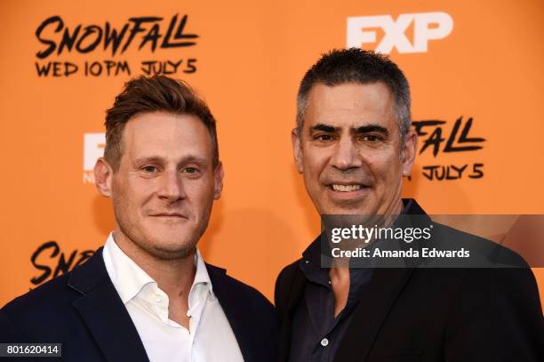 Executive producers Trevor Engelson and Michael London arrive at the premiere of FX's "Snowfall" at The Theatre at Ace Hotel on June 26, 2017 in Los...