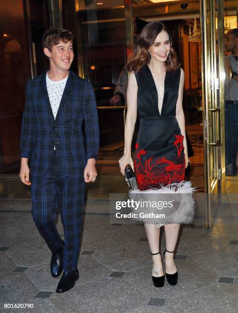 Alex Sharp and Lily Collins attend a private event to honor Anna Wintour being appointed a Dame Commander of the Order of the British Empire on June...