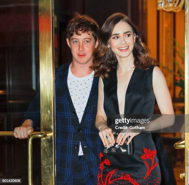 Alex Sharp and Lily Collins attend a private event to honor Anna Wintour being appointed a Dame Commander of the Order of the British Empire on June...