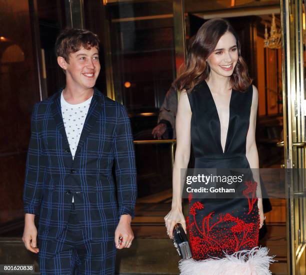 Alex Sharp and Lily Collins attend a private event to honor Anna Wintour being appointed a Dame Commander of the Order of the British Empire on June...