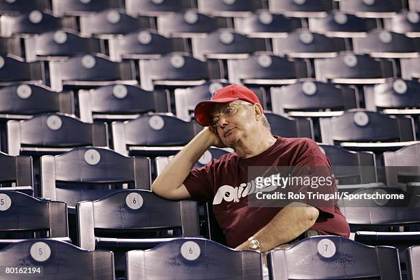 Fan of the Philadelphia Phillies looks on dejected as the Phillies were defeated by the Colorado Rockies during game two of the NLDS on October 4,...