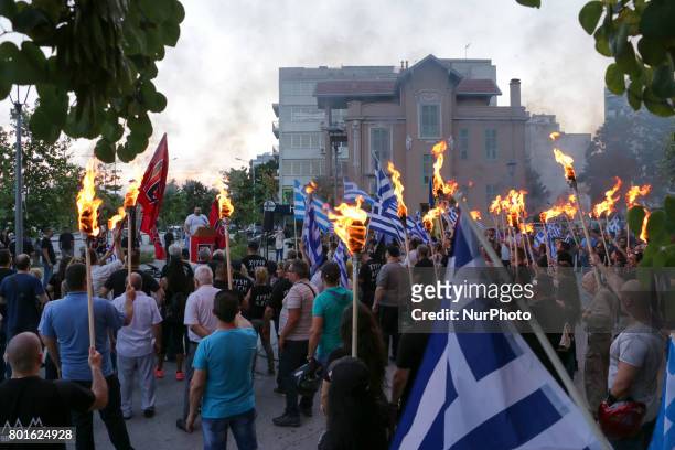 Hundreds of supporters of the nationalist Golden Dawn party held a torch-lit march in Thessaloniki, Greece on 25 June 2017, to protest against the...