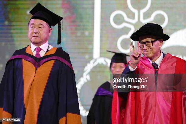 Li Ka-shing, Chinese entrepreneur, Billionaire, and Mo Yan, Chinese novelist and winner of the 2012 Nobel Prize in Literature attend the graduation...
