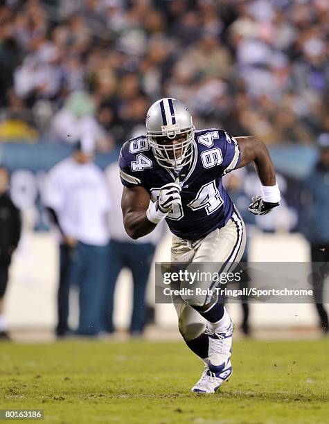 DeMarcus Ware of the Dallas Cowboys rushes the passer as William Thomas of the Philadelphia Eagles blocks at Lincoln Financial Field on November 4,...