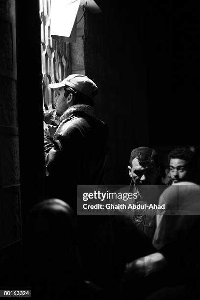 Iraqi refugees waiting since early in the morning to enter Syria, February 4 outside the Syrian Immigration office at the Tenaf border crossing....