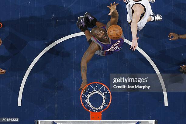 Shaquille O'Neal of the Phoenix Suns goes up for the shot during the NBA game against the Memphis Grizzlies on February 26, 2008 at FedExForum in...